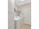 Laundry room with washer, dryer, and custom storage at 3339 Brenford Pl, Land O Lakes, FL 34638