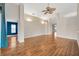 Open living area with hardwood floors and bright natural light at 3339 Brenford Pl, Land O Lakes, FL 34638