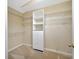 Spacious walk-in closet providing ample storage with built in shelving at 3339 Brenford Pl, Land O Lakes, FL 34638