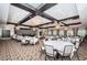 Expansive ballroom featuring elegant lighting, tables, and chairs for large gatherings at 5316 Stoic Vale Dr, Wimauma, FL 33598