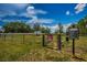 A fenced-in dog park offers a safe and fun space for furry friends to play at 5316 Stoic Vale Dr, Wimauma, FL 33598