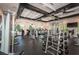 Fully-equipped gym with state-of-the-art equipment for a comprehensive workout experience at 5316 Stoic Vale Dr, Wimauma, FL 33598