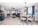 Inviting living room with wood-look flooring, modern furniture, and stylish decor offers a comfortable living space at 5316 Stoic Vale Dr, Wimauma, FL 33598