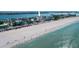 Gorgeous aerial view of the condo building near the beach, showcasing the idyllic coastal setting at 555 Gulf Way # 7N, St Pete Beach, FL 33706