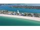 Scenic aerial shot of a beachfront condo building, offering breathtaking coastal views at 555 Gulf Way # 7N, St Pete Beach, FL 33706