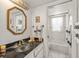 Well-maintained bathroom featuring a stylish sink and a shower/tub combo at 555 Gulf Way # 7N, St Pete Beach, FL 33706