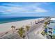 Breathtaking view of a pristine beach, showcasing the oceanfront property's desirable location and beautiful surroundings at 555 Gulf Way # 7N, St Pete Beach, FL 33706