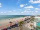 Breathtaking beach view from above showcases the white sands and oceanfront access to nearby shops and restaurants at 555 Gulf Way # 7N, St Pete Beach, FL 33706