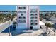 Charming multi-story condo building featuring private balconies and covered parking at 555 Gulf Way # 7N, St Pete Beach, FL 33706