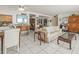 A beautiful, well-lit living room with tile flooring and comfortable furniture at 555 Gulf Way # 7N, St Pete Beach, FL 33706