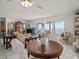 Open floor plan showing living and dining area with bright, airy atmosphere and ocean views at 555 Gulf Way # 7N, St Pete Beach, FL 33706