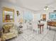 Cozy living room with charming decor and a water view at 555 Gulf Way # 7N, St Pete Beach, FL 33706