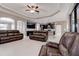 Spacious living room featuring open concept layout, ceiling fan, and views of the kitchen at 624 Tierra Dr, Spring Hill, FL 34609