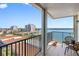 Enjoy beautiful water views from this spacious balcony with chairs and a small table at 6287 Bahia Del Mar Cir # 606, St Petersburg, FL 33715