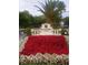 The entrance to New Port Richey, Florida features attractive flower beds and a decorative sign at 7040 Cognac Dr # 1, New Port Richey, FL 34653