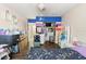 Bedroom with dark wood floors and a closet at 10171 Patrick St, Brooksville, FL 34601