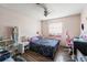 Bedroom with dark wood floors and natural light at 10171 Patrick St, Brooksville, FL 34601