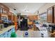 Kitchen with dark wood cabinets and modern appliances at 10171 Patrick St, Brooksville, FL 34601