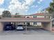 Assigned covered parking spots in front of building at 10346 Carrollwood Ln # 171, Tampa, FL 33618