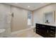 Modern bathroom featuring a stylish vanity, tiled flooring, and contemporary fixtures at 11935 Riverhills Dr, Temple Terrace, FL 33617