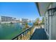 Balcony view overlooking water, docks, condos and the clear blue skies at 124 Leeward Is, Clearwater Beach, FL 33767