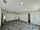 Spacious bedroom with gray flooring, recessed lighting, and ample closet space at 16417 Lake Byrd Dr, Tampa, FL 33618