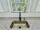 Close up on the kitchen sink, granite counters and window at 16417 Lake Byrd Dr, Tampa, FL 33618