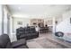 Spacious living room seamlessly blending into the kitchen, perfect for modern living at 16631 Mooner Plank Cir Cir, Wimauma, FL 33598