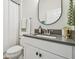 This bathroom features a gray countertop and modern fixtures at 17628 Breakaway St, Land O Lakes, FL 34638