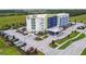 A modern Springhill Suites hotel featuring a large parking lot and manicured landscape at 17628 Breakaway St, Land O Lakes, FL 34638