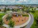 Elevated view of a local park with wooden playground structures at 17628 Breakaway St, Land O Lakes, FL 34638