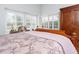 Comfortable bedroom with large windows and lots of light at 18934 Avenue Biarritz, Lutz, FL 33558