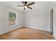 Bedroom with hard surface floors and a ceiling fan at 2032 Sunset Meadow Dr, Clearwater, FL 33763