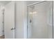 Shower room featuring a shower with glass door and a chrome shower head at 2032 Sunset Meadow Dr, Clearwater, FL 33763