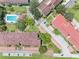 Aerial view of a well-maintained condominium community with a swimming pool at 2583 Countryside Blvd # 3212, Clearwater, FL 33761