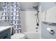 Contemporary bathroom featuring a sleek bathtub and a rainfall shower head at 3300 Haviland Ct # 304, Palm Harbor, FL 34684