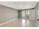 Bedroom features tile flooring, neutral paint, and an abundance of natural light at 3544 Landale Dr, Holiday, FL 34691