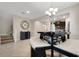 Inviting living space showcasing the staircase, dining, and kitchen areas at 3568 Pine Ribbon Dr, Land O Lakes, FL 34638