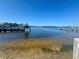 Picturesque waterfront view with dock and boat on a clear day at 4941 Waterside Dr, Port Richey, FL 34668