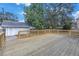 Large wooden back deck, ideal for entertaining, with railing and a detached garage at 535 28Th N Ave, St Petersburg, FL 33704