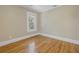 Bedroom with hardwood floors and natural light from the window at 535 28Th N Ave, St Petersburg, FL 33704