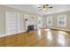 Inviting living room featuring hardwood floors, built-in shelving, fireplace, and an abundance of light at 535 28Th N Ave, St Petersburg, FL 33704