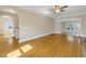 Bright living room with hardwood floors, open layout, and a doorway to another room at 535 28Th N Ave, St Petersburg, FL 33704