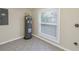 Small room with hot water heater and small window at 535 28Th N Ave, St Petersburg, FL 33704