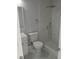 Contemporary bathroom features a walk-in shower, updated vanity and commode at 6008 Memorial Hwy, Tampa, FL 33615