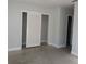 Spacious bedroom featuring neutral walls, large closet and base trim at 6008 Memorial Hwy, Tampa, FL 33615