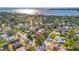 Scenic aerial view of a waterfront neighborhood, showcasing attractive houses and green trees at 612 Montezuma Dr, Bradenton, FL 34209