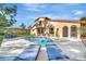 Refreshing backyard pool with sun loungers, an outdoor table, and a well-manicured lawn at 612 Montezuma Dr, Bradenton, FL 34209