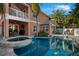 Stunning backyard with pool, spa, and covered patio perfect for outdoor living at 6411 Grenada Island Ave, Apollo Beach, FL 33572