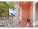 Balcony view of the neighborhood with palm trees and neighboring homes at 6411 Grenada Island Ave, Apollo Beach, FL 33572